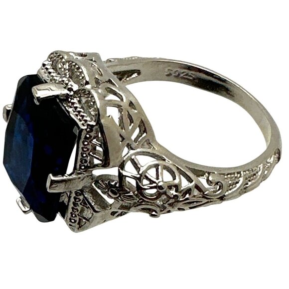Blue Tanzanite Ring Size 7.75 Intricate Filigree Silver Plating Timeless Glam - Picture 3 of 7